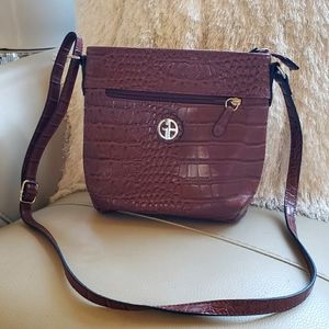 Brown faux leather purse by Giani Bernini